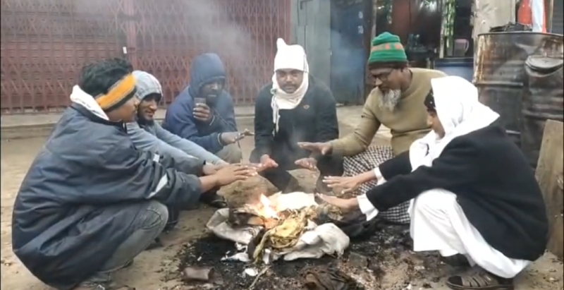 bite-of-cold-makes-people-to-get-warm-from-an-earthen-cooker-in-kalapara-on-wednesday-34fa4909dac6e146fe08dd30bc26d4801767207978.jpg