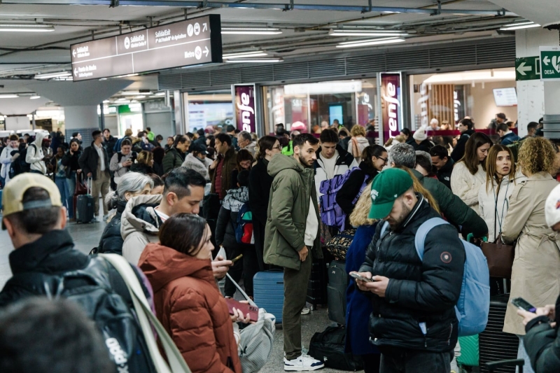 passengers-wait-in-the-hall-of-madrid-train-station-on-sunday-january-18-following-the-announcement-of-the-suspension-of-service-due-to-an-accident-in-which-two-trains-derailed-in-cordoba-99fdb51c362276dbb991d8d1242c2b021768802011.jpeg