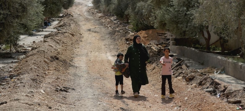 a-woman-and-two-children-walk-near-the-city-of-jenin-in-the-west-bank-ee05b7a31cc27bdc3e00fc2c5b31ff901786765647.jpg