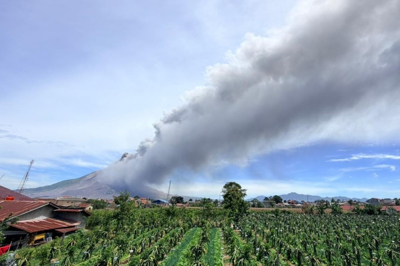 mount-sinabung-on-indonesia-erupted-monday-spewing-a-column-of-black-ash-and-smoke-3500-meters-11482-feet-from-the-top-of-the-mountain-into-the-sky-over-sumatra-island-0405ac7755153c7723c9112c0c2865851788234704.jpg