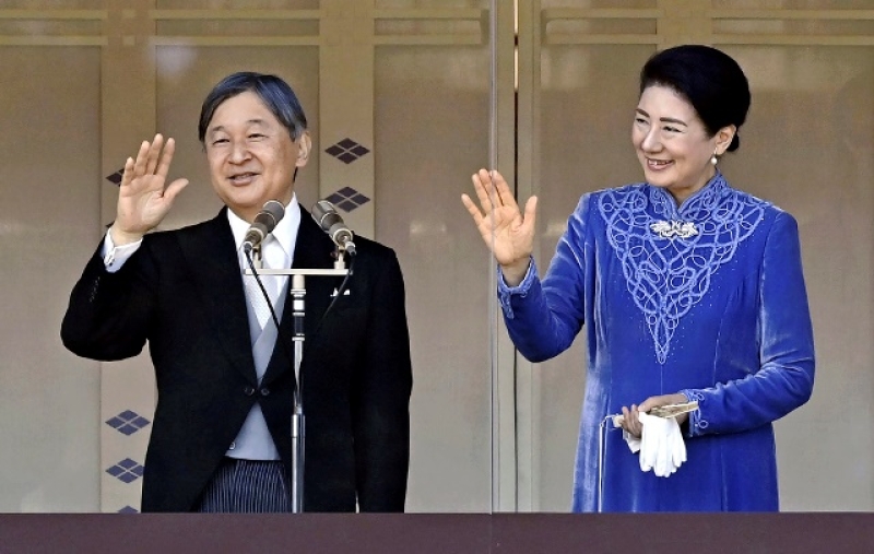 japanese-emperor-naruhito-accompanied-by-empress-masako-right-waves-to-well-wishers-from-the-balcony-of-the-imperial-palace-in-tokyo-on-his-65th-birthday-sunday-feb-3899dbc23649a5eed28818df1dfdaddf1740367858.jpg